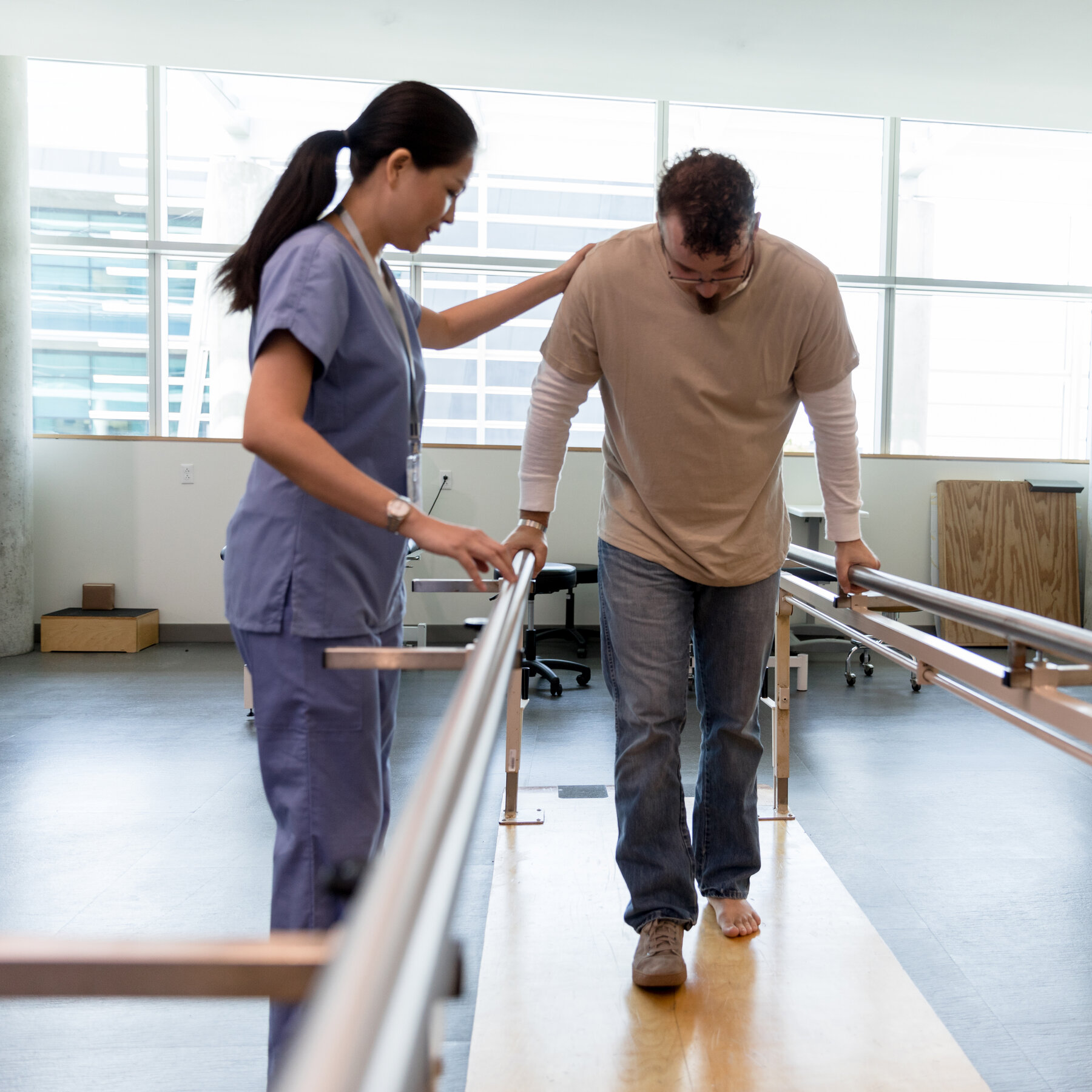 Professional physiotherapist with patient